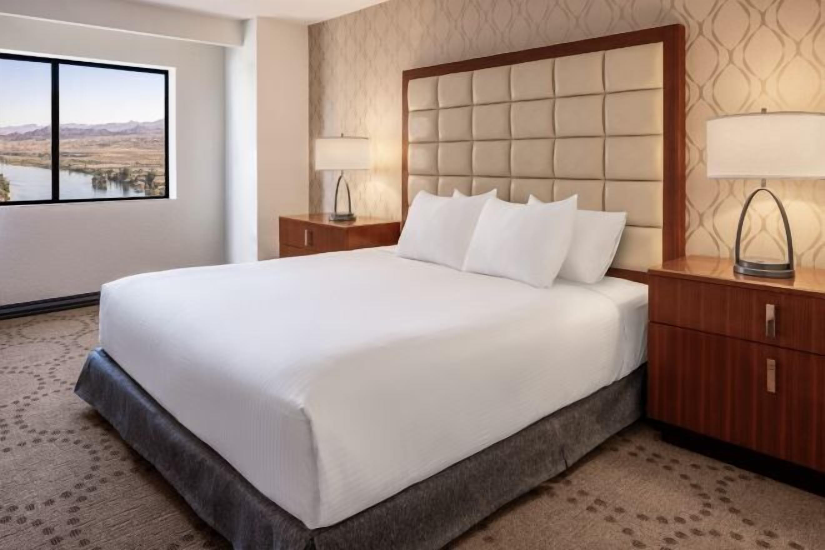 Hypo-allergenic bedding, pillowtop beds, desk, laptop workspace