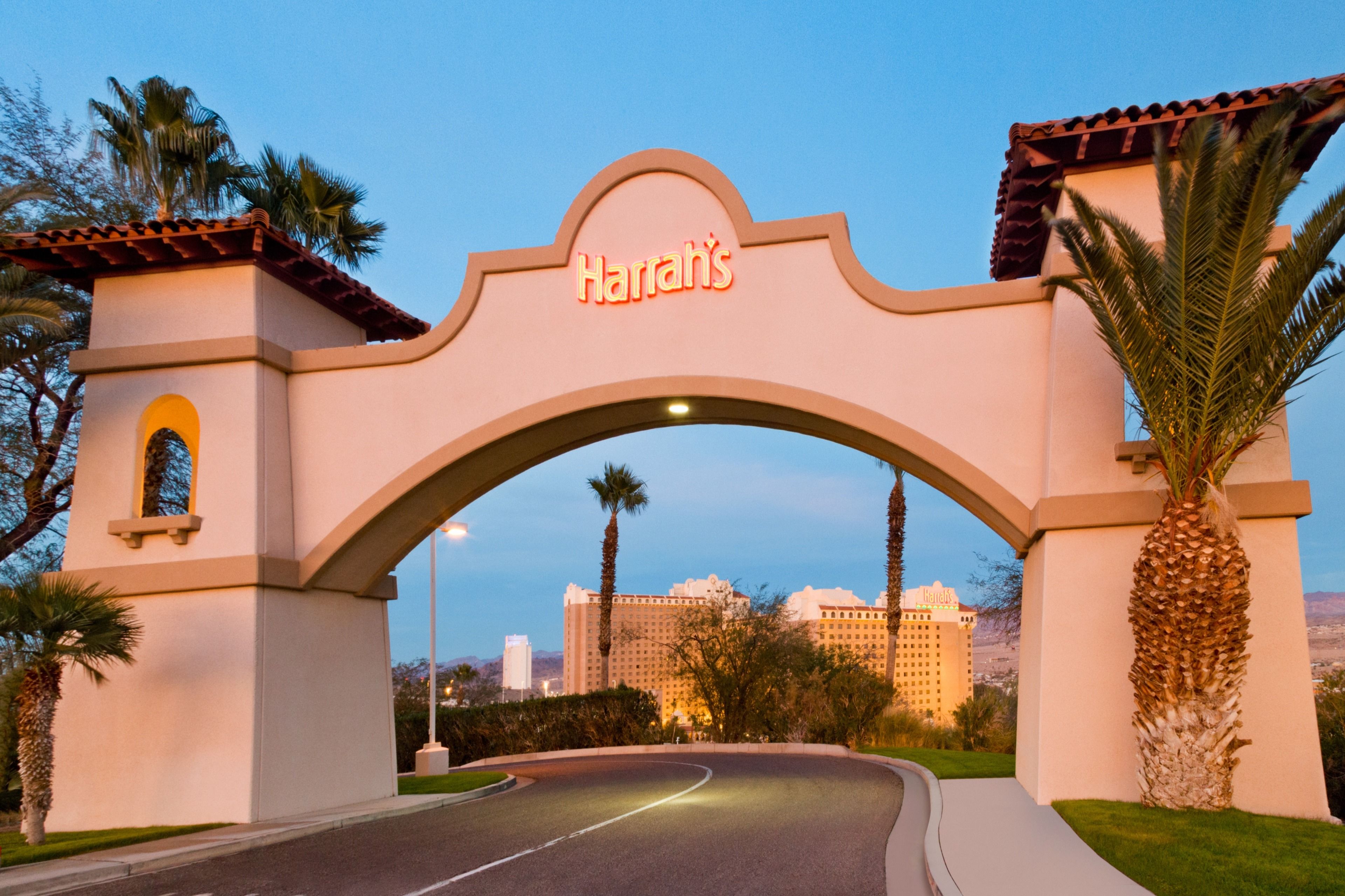 A hotel entrance with a sign reading "Harrath's".