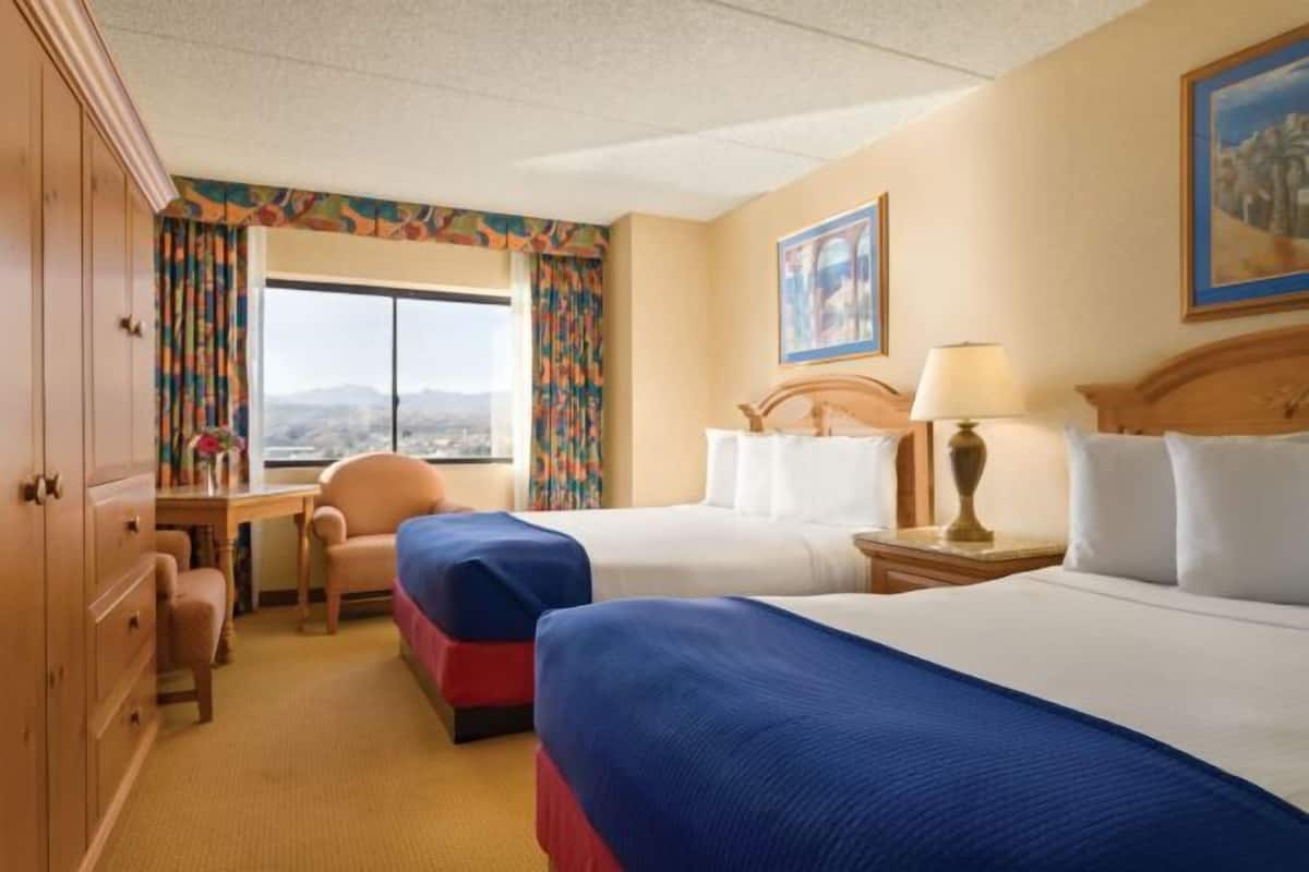 Hypo-allergenic bedding, pillowtop beds, desk, laptop workspace