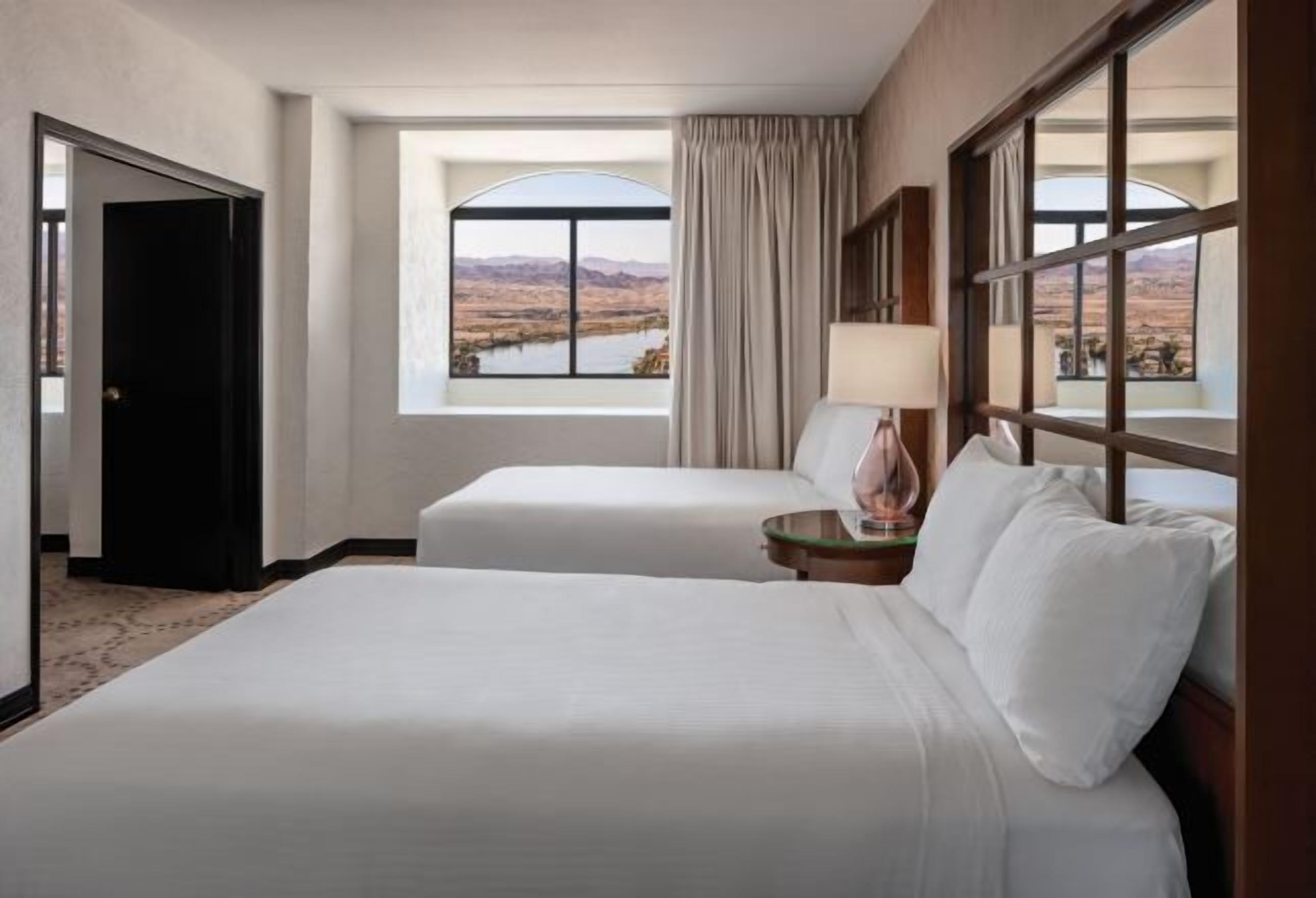 Hypo-allergenic bedding, pillowtop beds, desk, laptop workspace