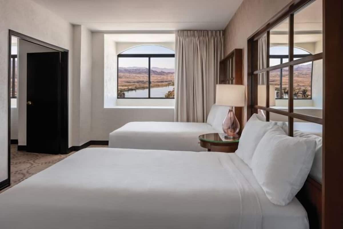 Hypo-allergenic bedding, pillowtop beds, desk, laptop workspace