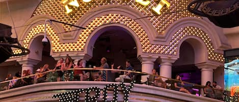 The exterior of the Golden Nugget Casino with a prominent marquee and a Liquor Bar sign.