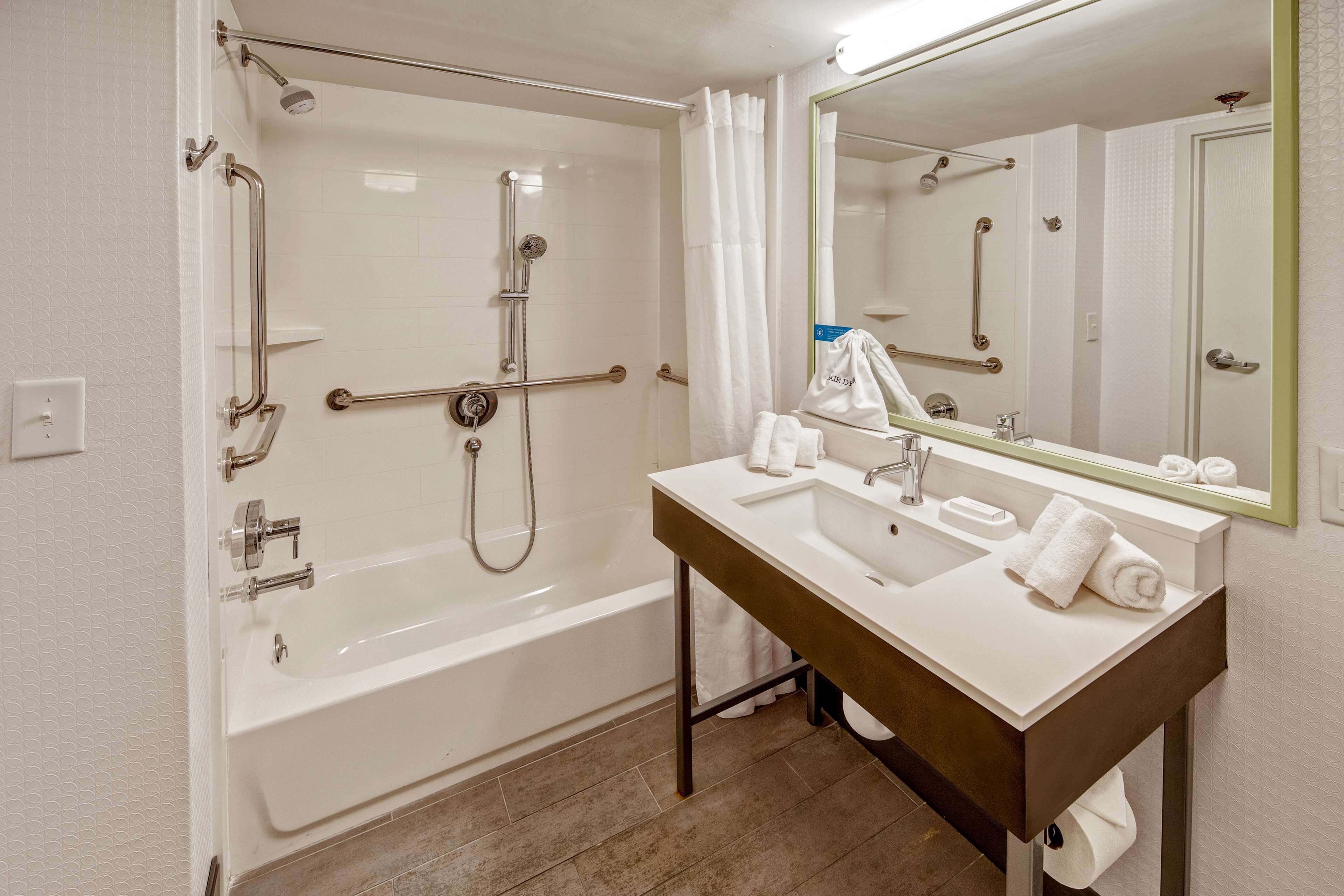 combined shower/bathtub, free toiletries, hair dryer, towels