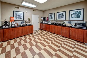 Guests can prepare meals and enjoy a convenient self-service experience in this well-equipped kitchen.