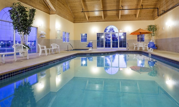 Indoor pool, open 10:00 AM to 11:00 PM, pool umbrellas