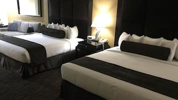 Family Suite, Multiple Beds, Non Smoking | Living area | 50-inch TV with satellite channels