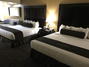 Family Suite, Multiple Beds, Non Smoking | Living area | 50-inch TV with satellite channels