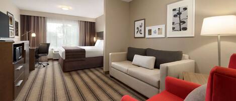 Studio suite, 1 kingsize bed, niet-roken | 1 slaapkamer, hypoallergeen beddengoed, donsdekens, een bureau
