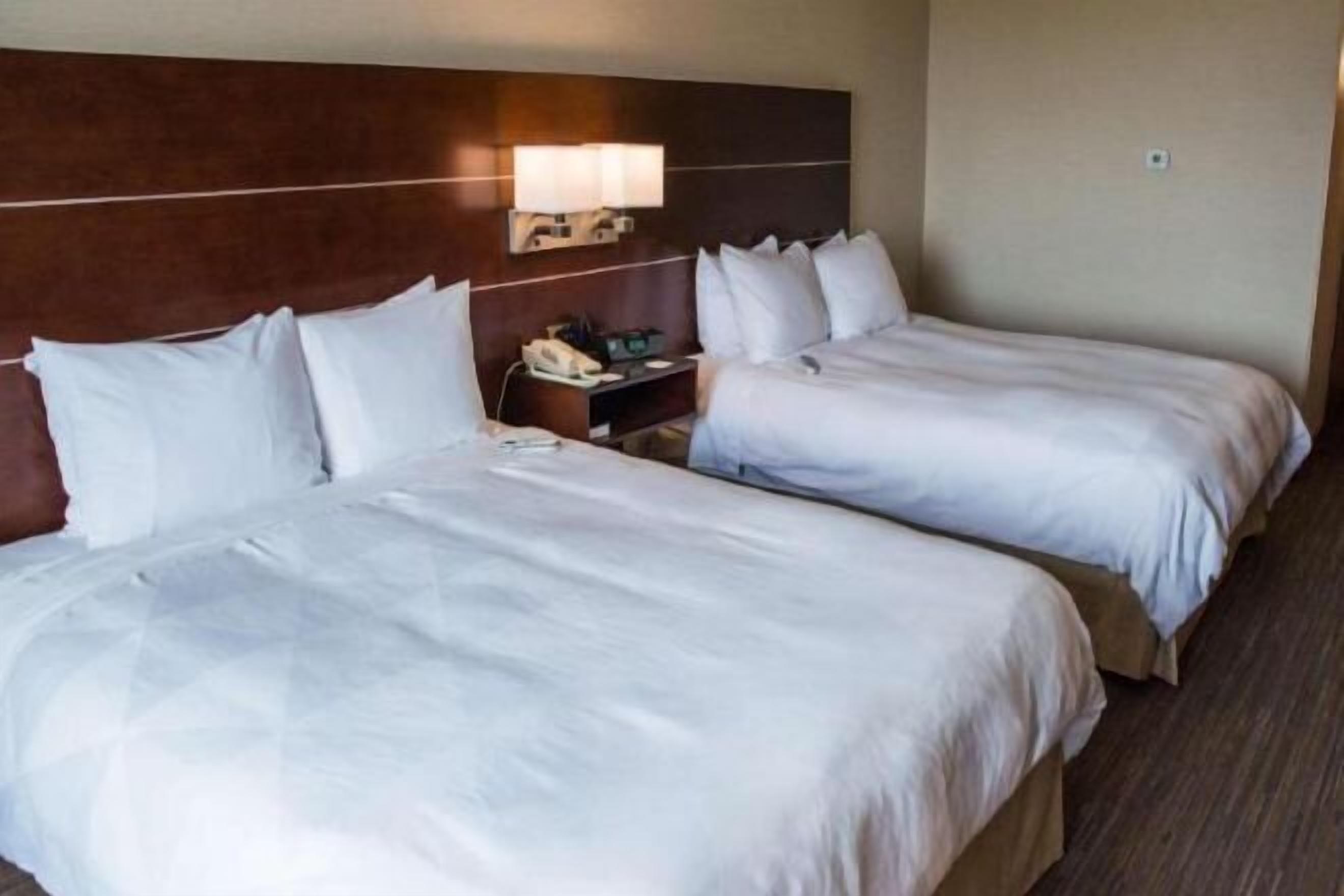 Premium bedding, down duvets, pillow-top beds, in-room safe