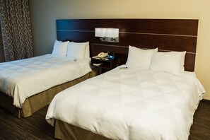 Premium bedding, down comforters, pillowtop beds, in-room safe