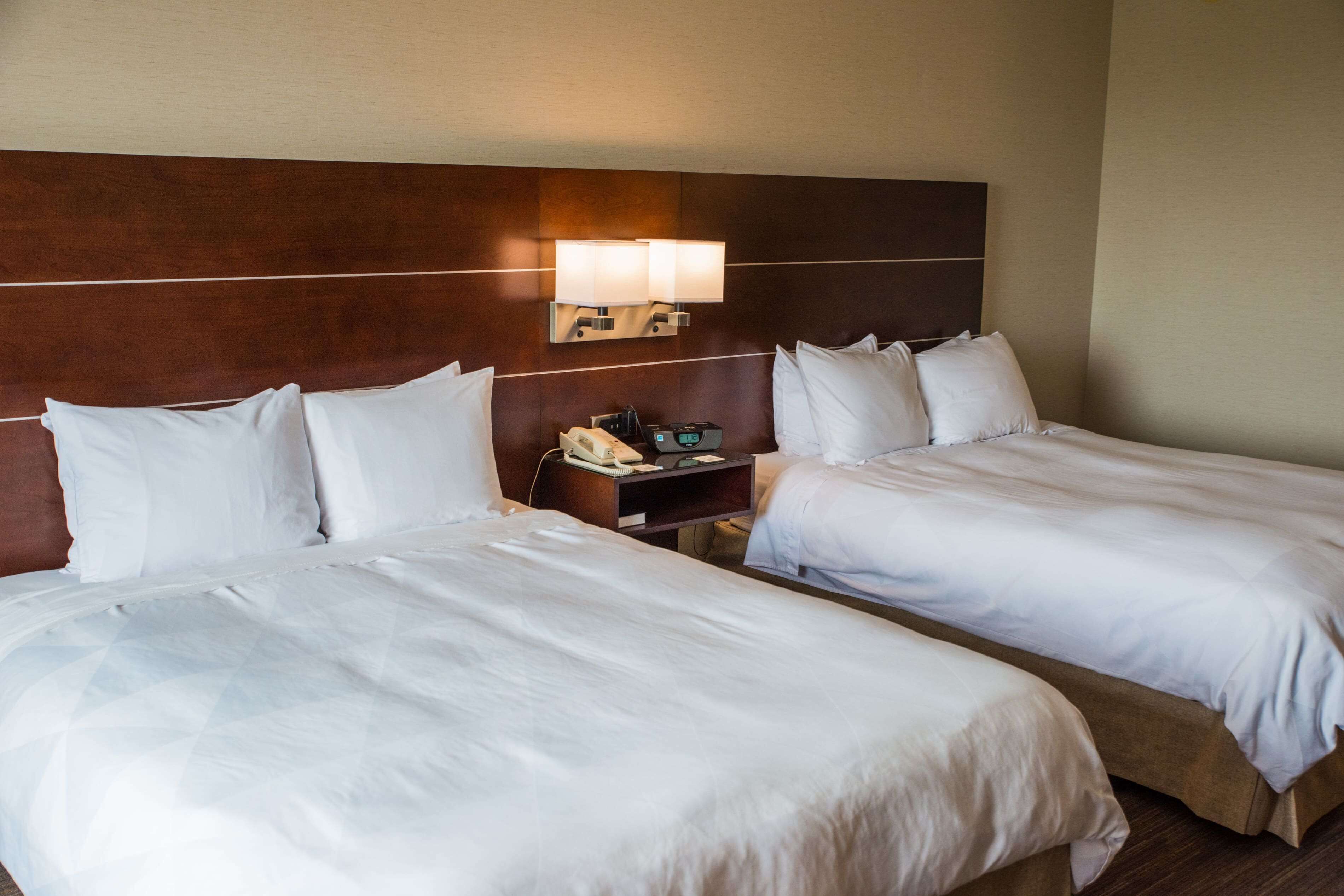 Premium bedding, down comforters, pillowtop beds, in-room safe