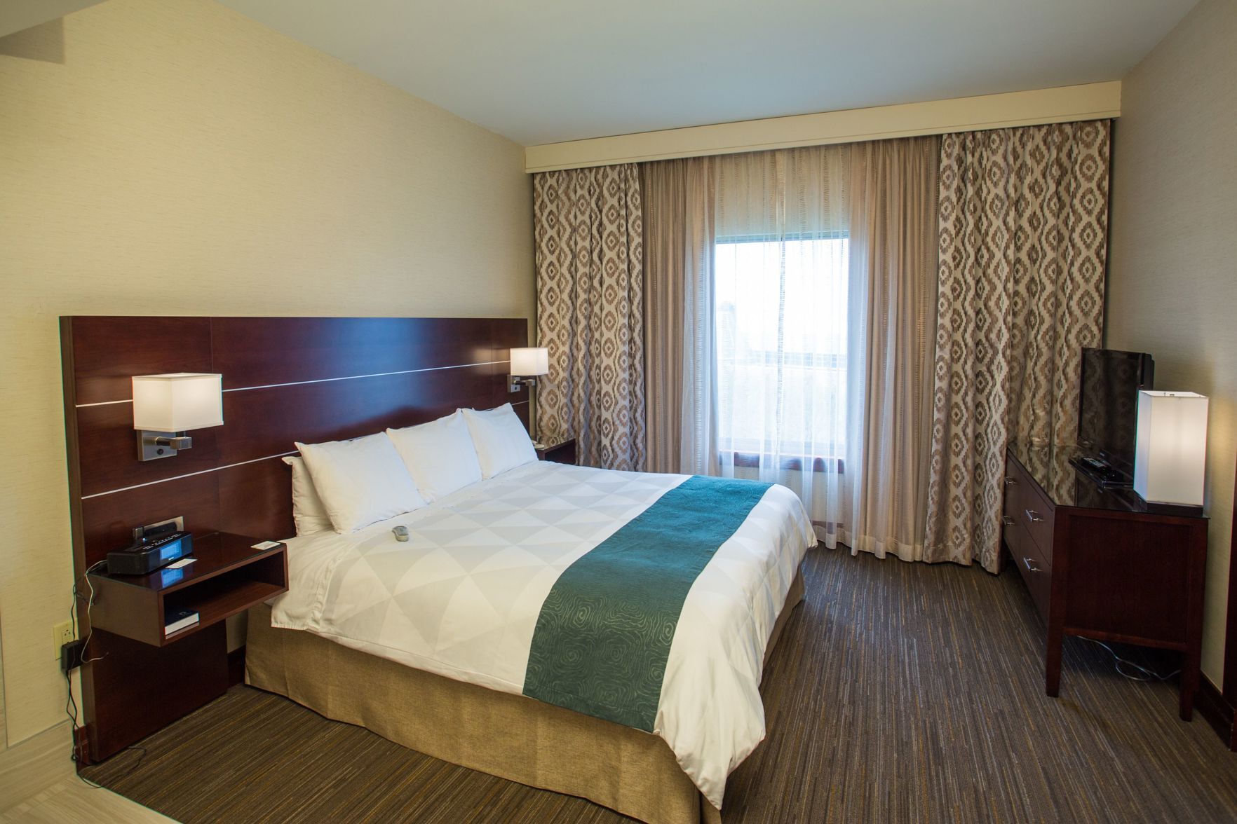Premium bedding, down comforters, pillowtop beds, in-room safe