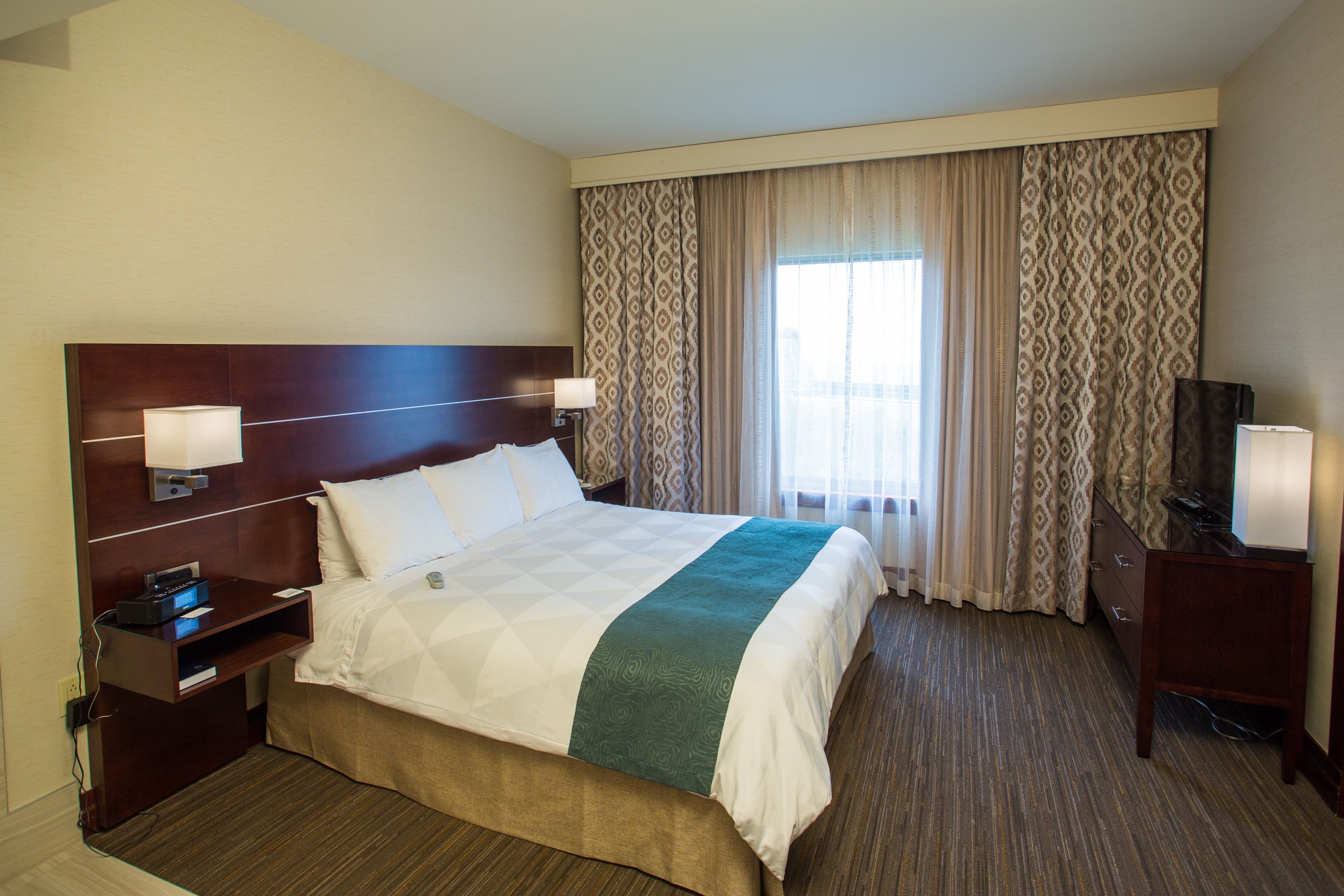 Premium bedding, down comforters, pillowtop beds, in-room safe