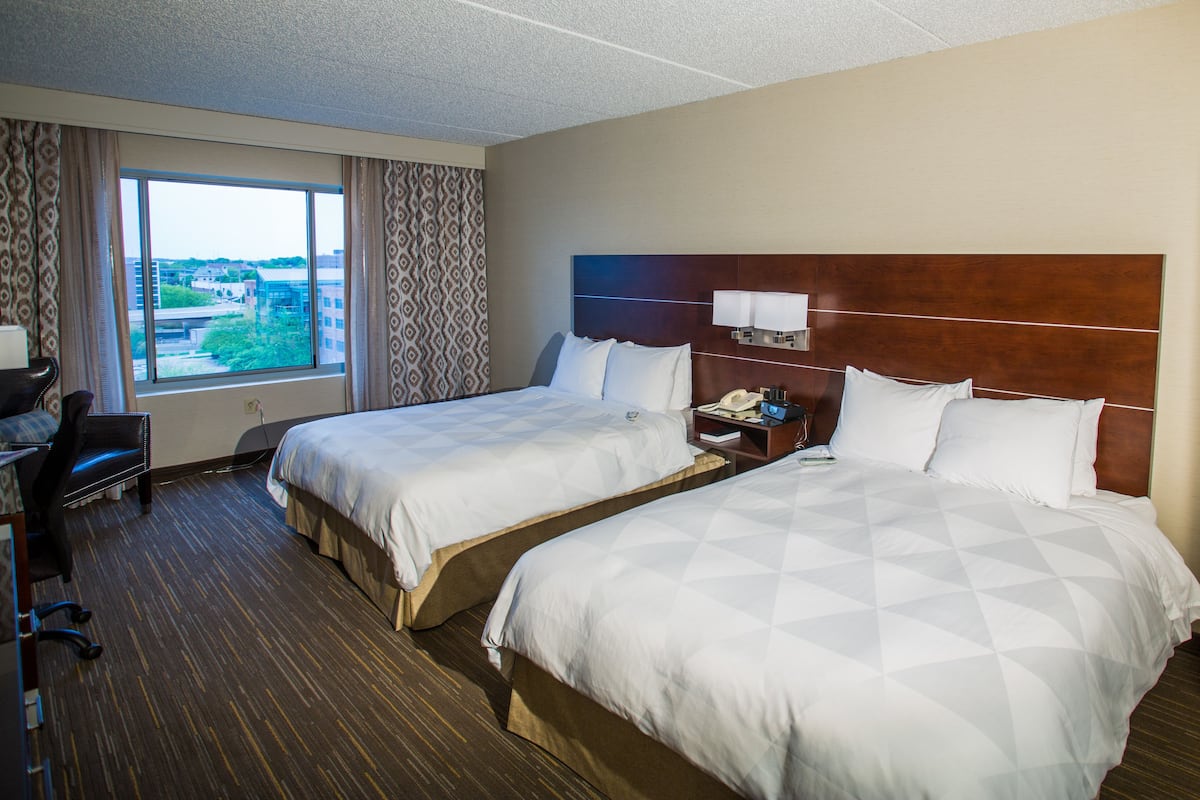 Premium bedding, down comforters, pillowtop beds, in-room safe
