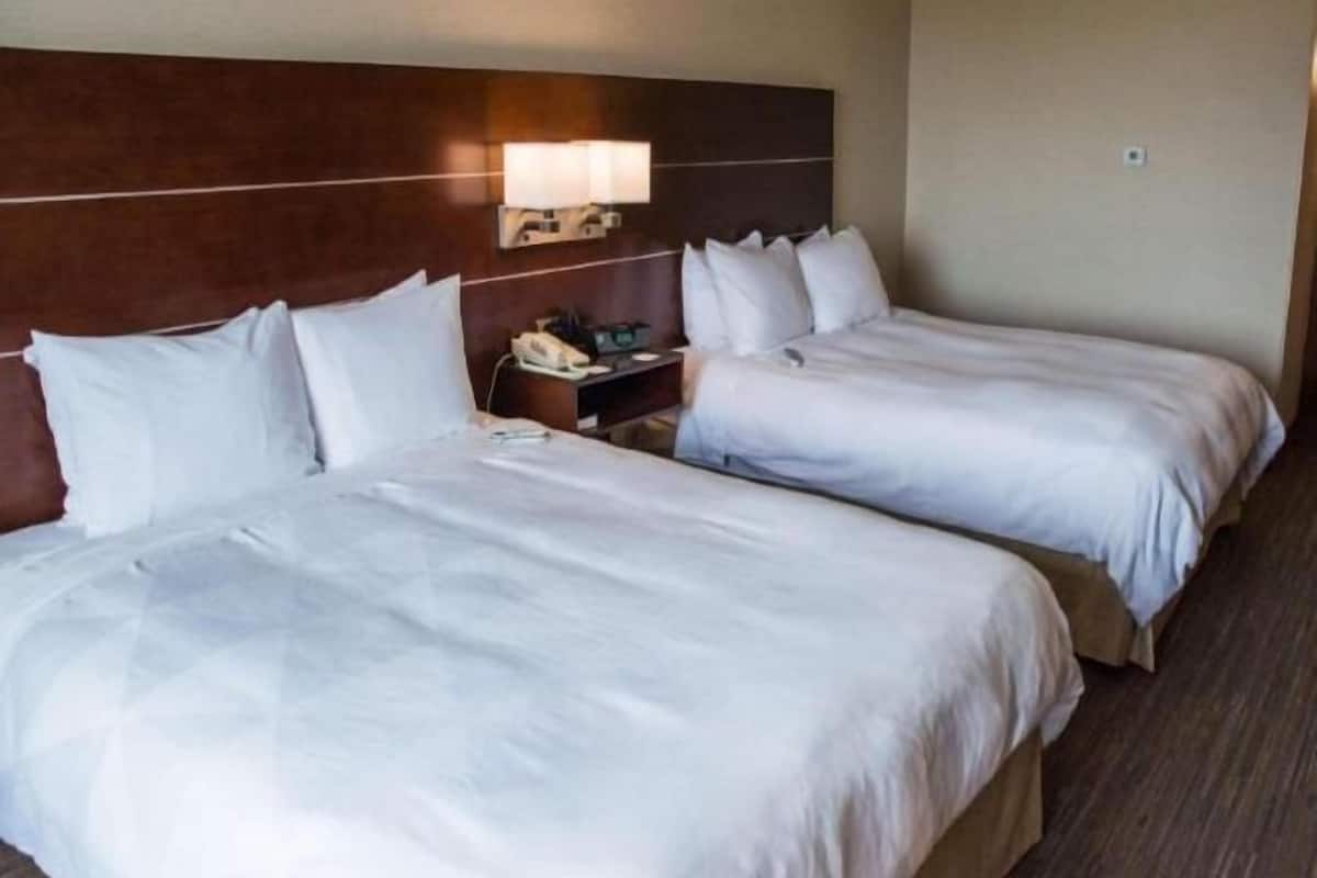 Premium bedding, down duvets, pillow-top beds, in-room safe