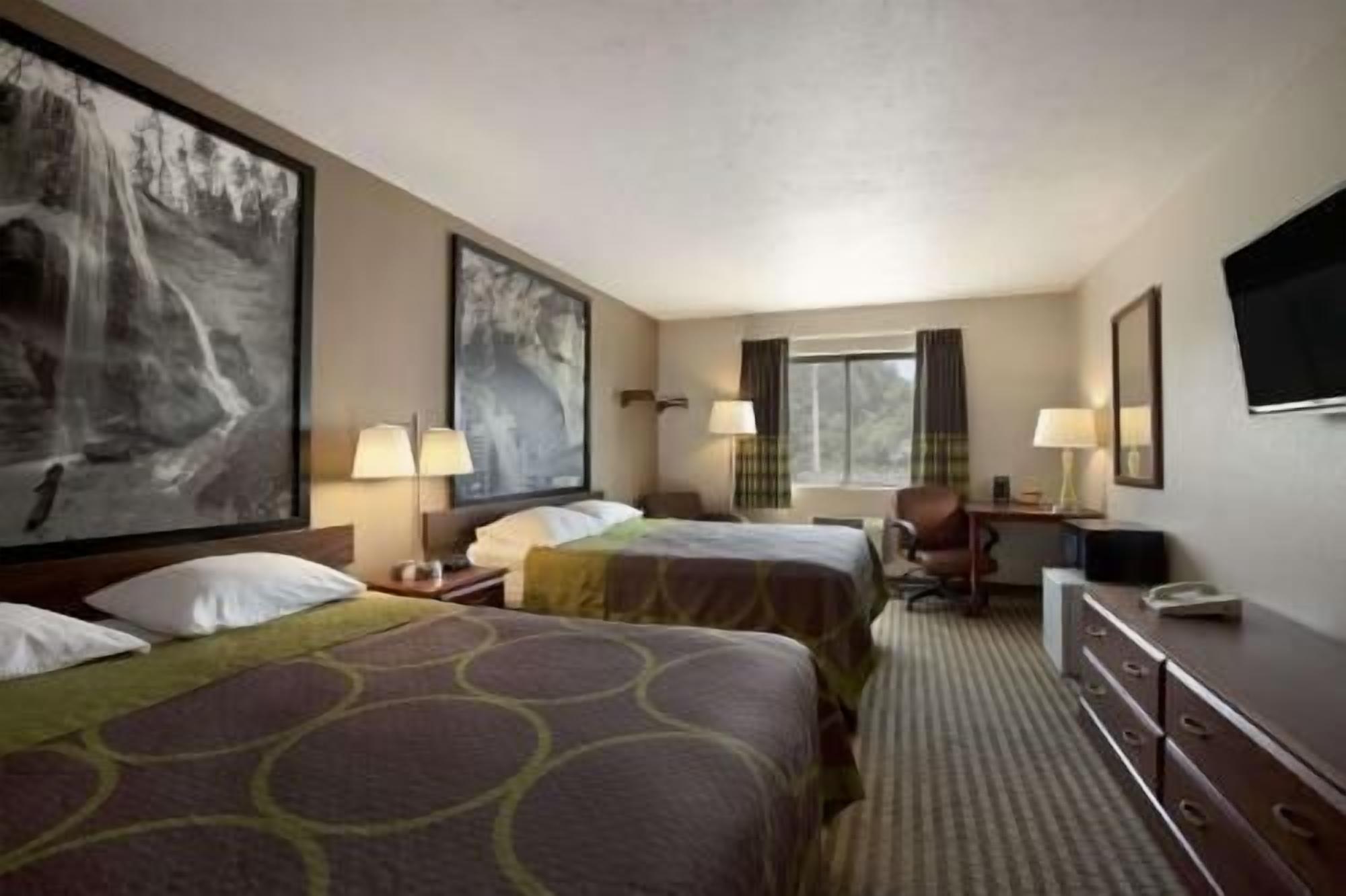 Premium bedding, pillowtop beds, desk, laptop workspace
