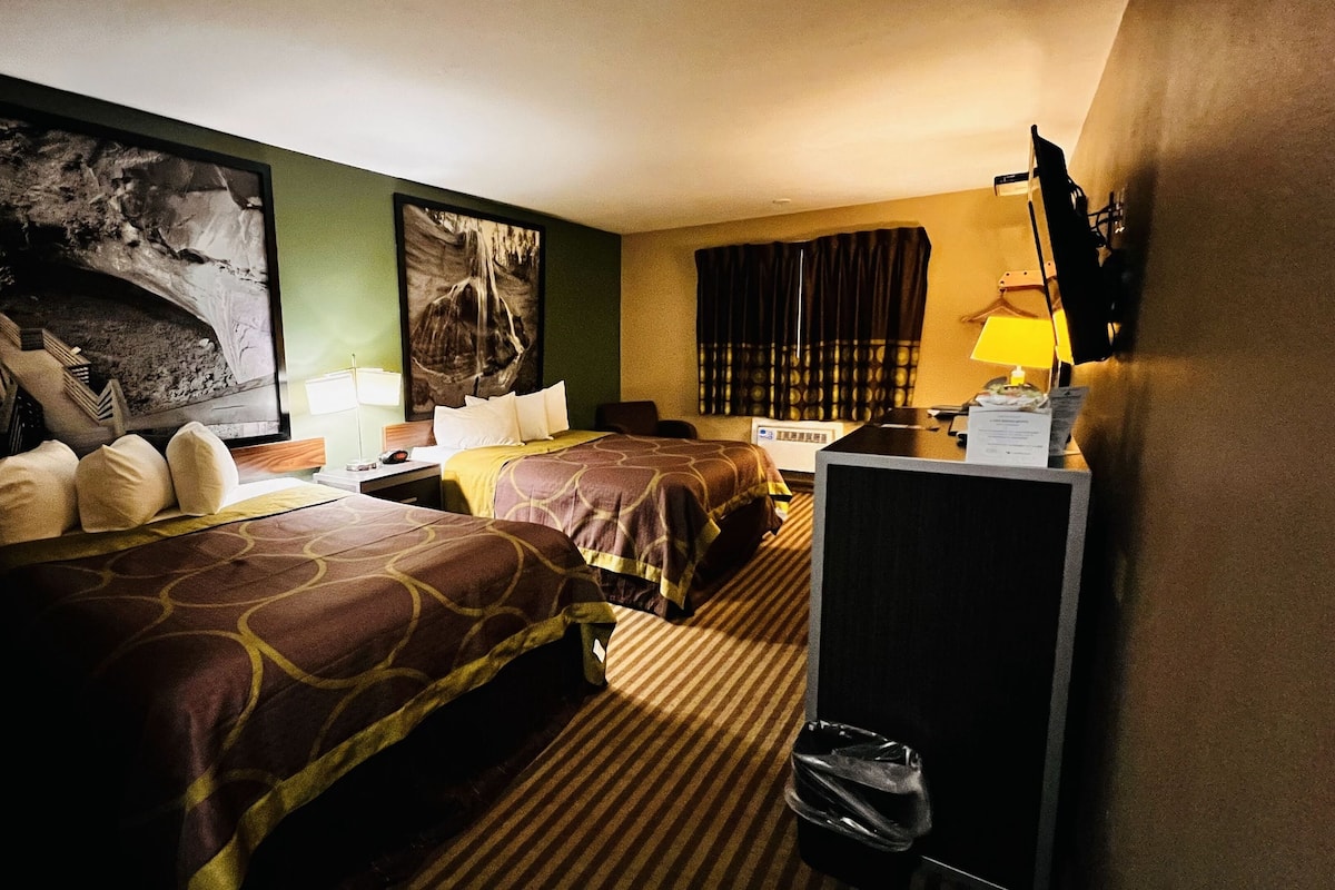 Premium bedding, pillow-top beds, desk, laptop workspace