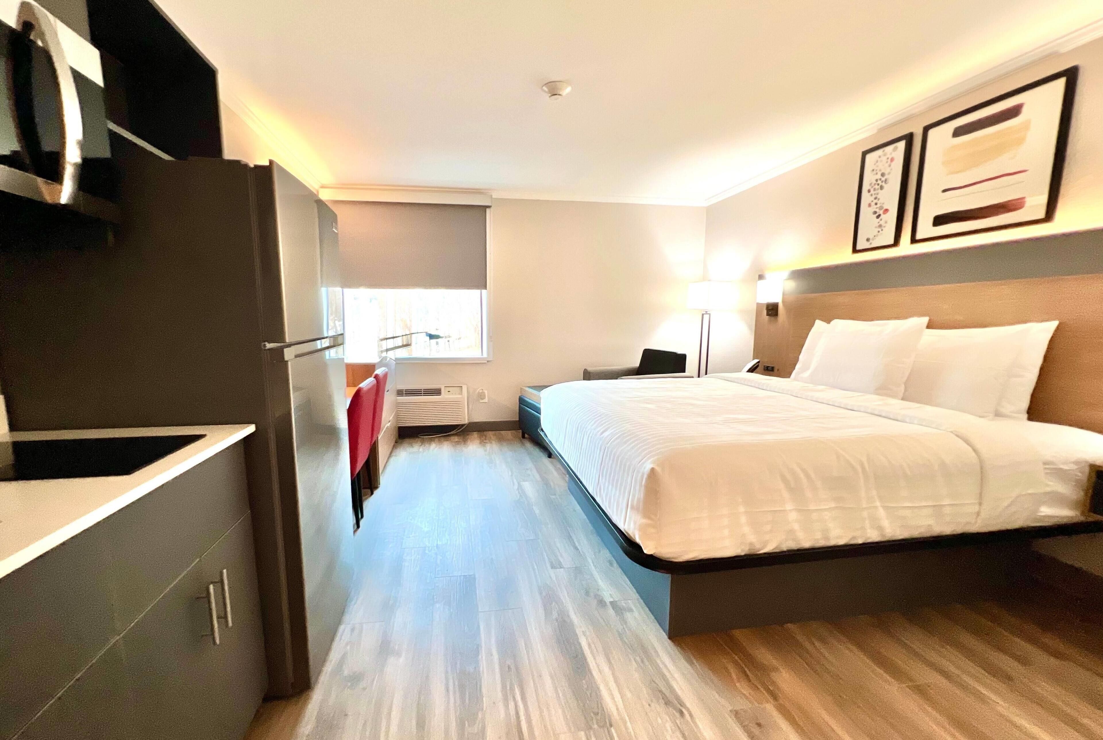 Premium bedding, desk, blackout drapes, iron/ironing board