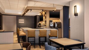 A modern restaurant with a bar area, seating arrangements, and a visible sign for 'The Placery'. - Hyatt Place Columbus Dublin (Dublin)