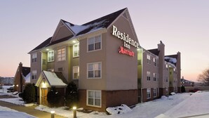 A multi-story building with a sign reading "Residence Inn Marriott."