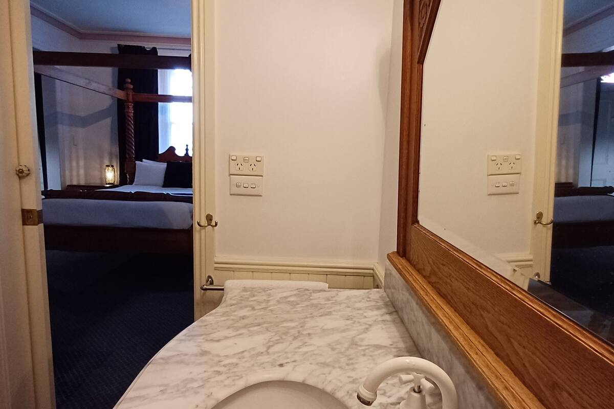 superior double room | bathroom | shower, free toiletries, hair dryer, towels