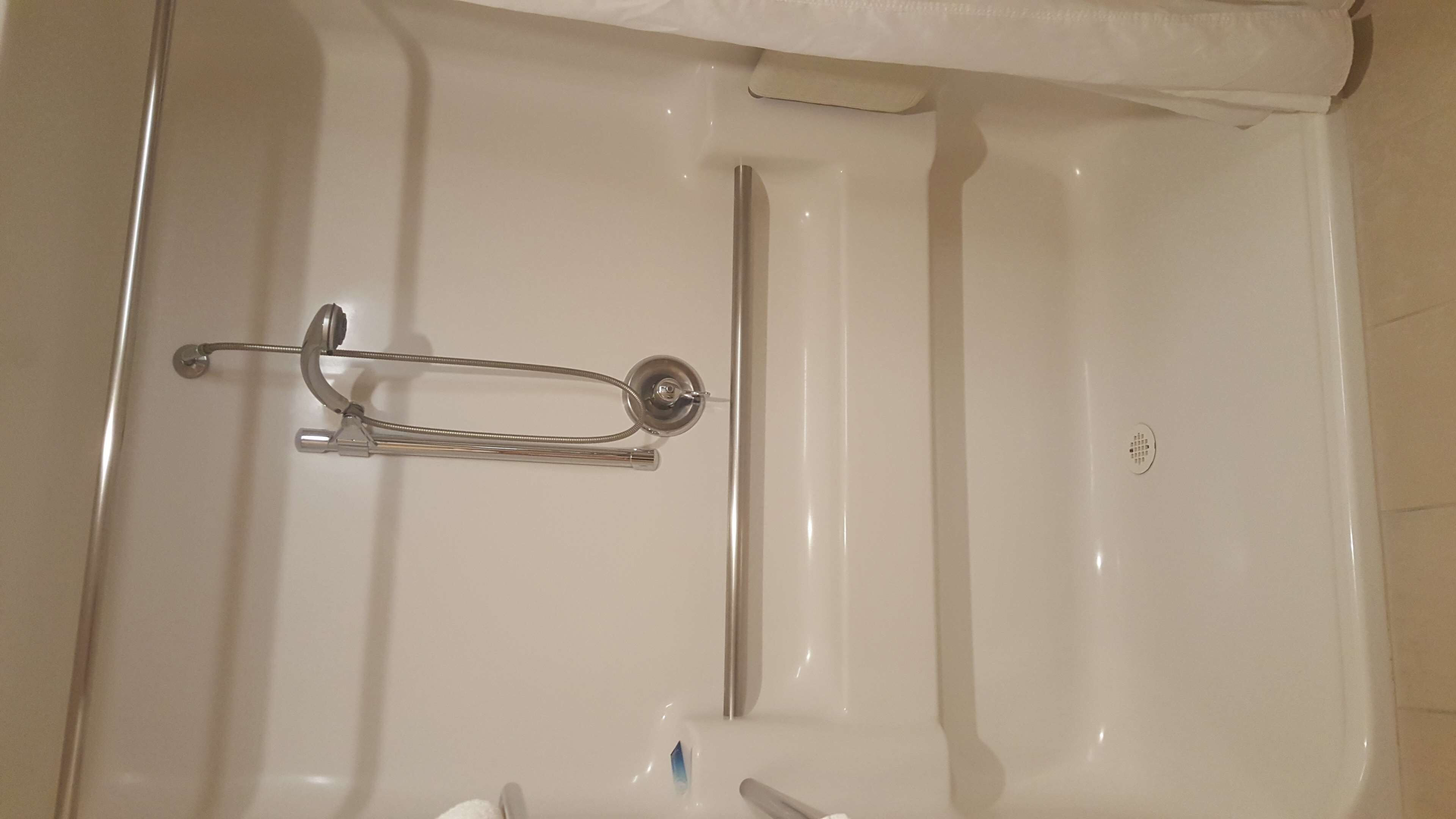 combined shower/bathtub, free toiletries, hair dryer, towels