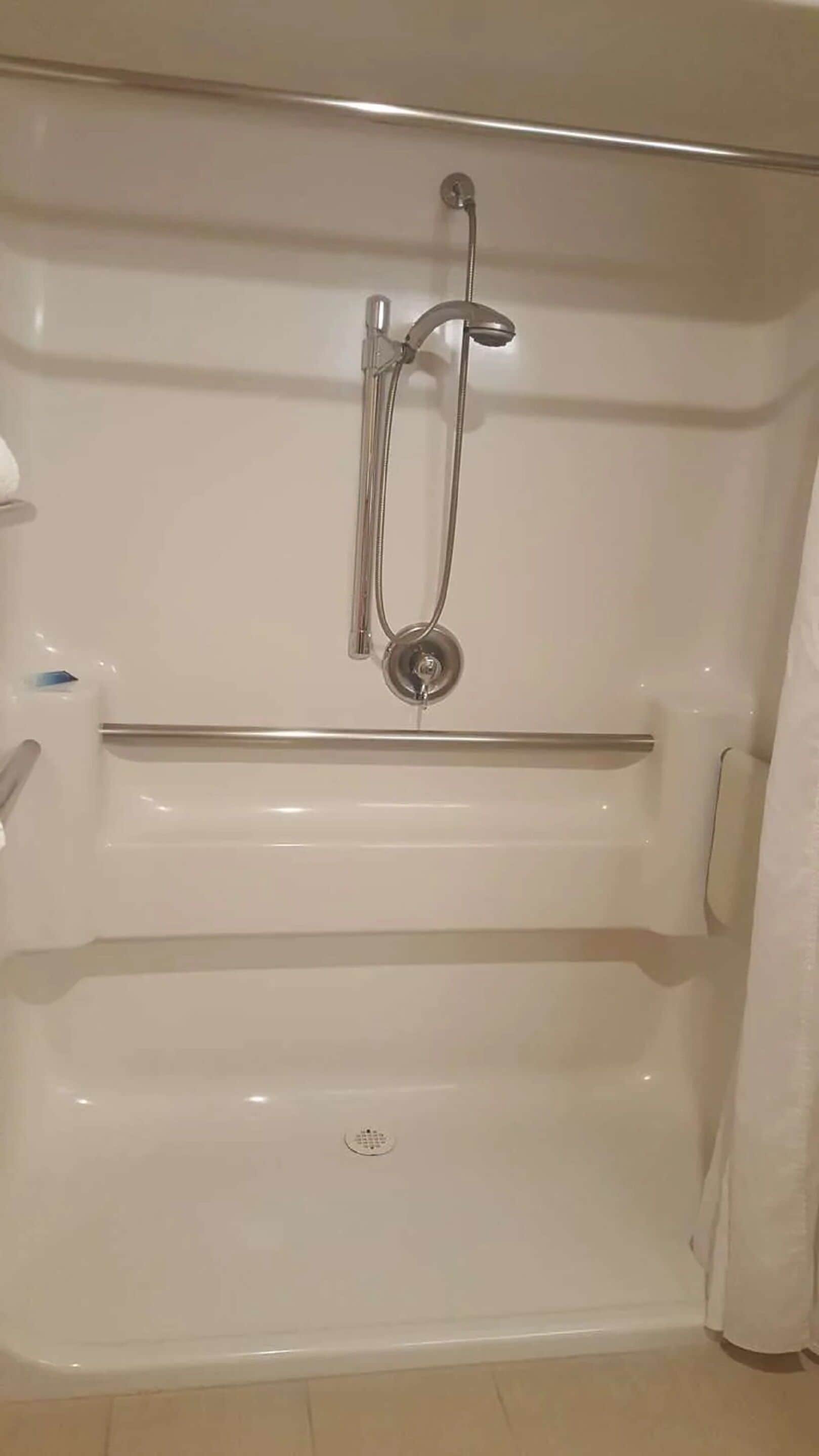 combined shower/bathtub, free toiletries, hair dryer, towels