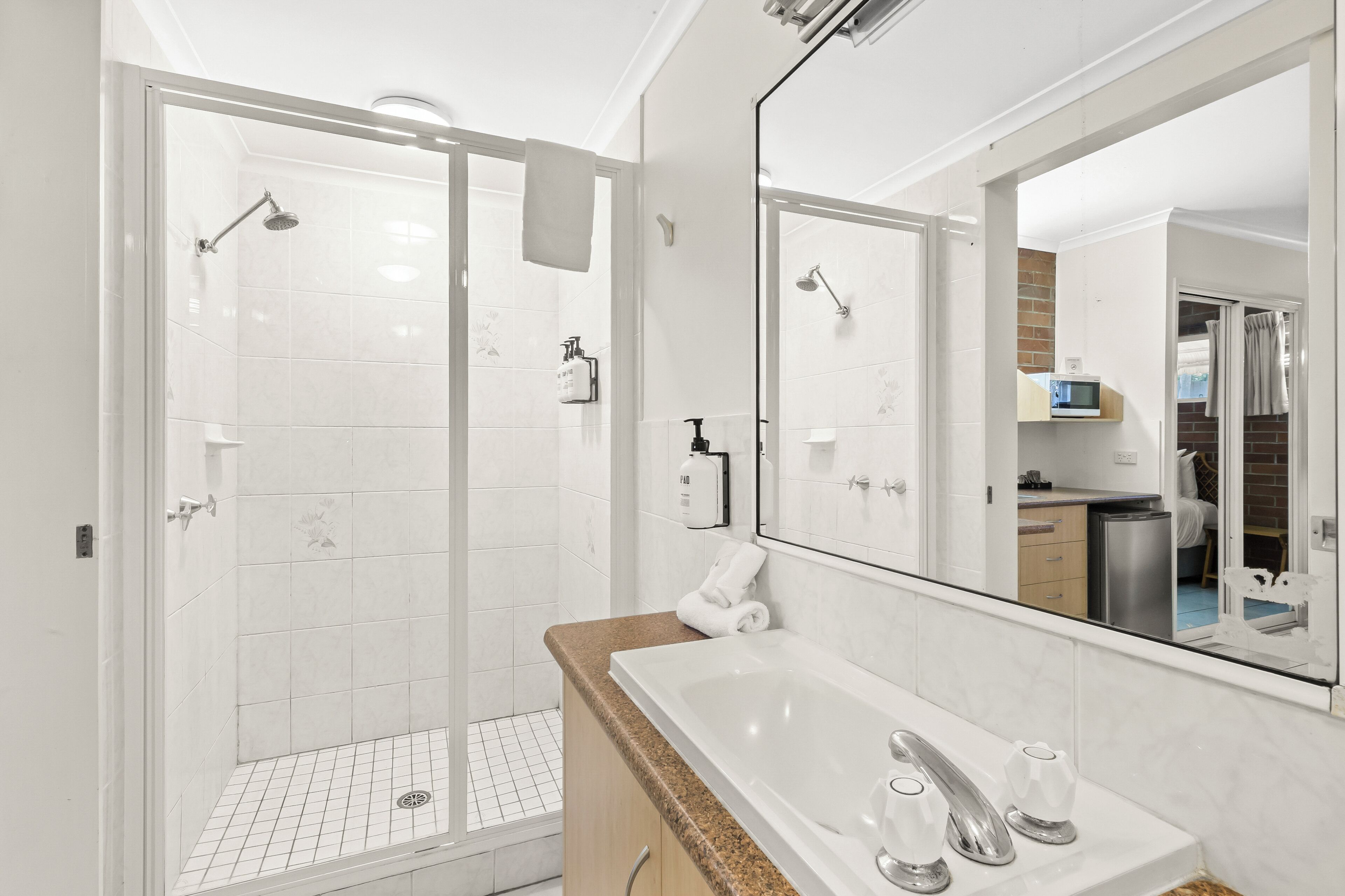 standard room, non smoking (2 queen beds, 2 single beds) | bathroom | free toiletries, hair dryer, towels