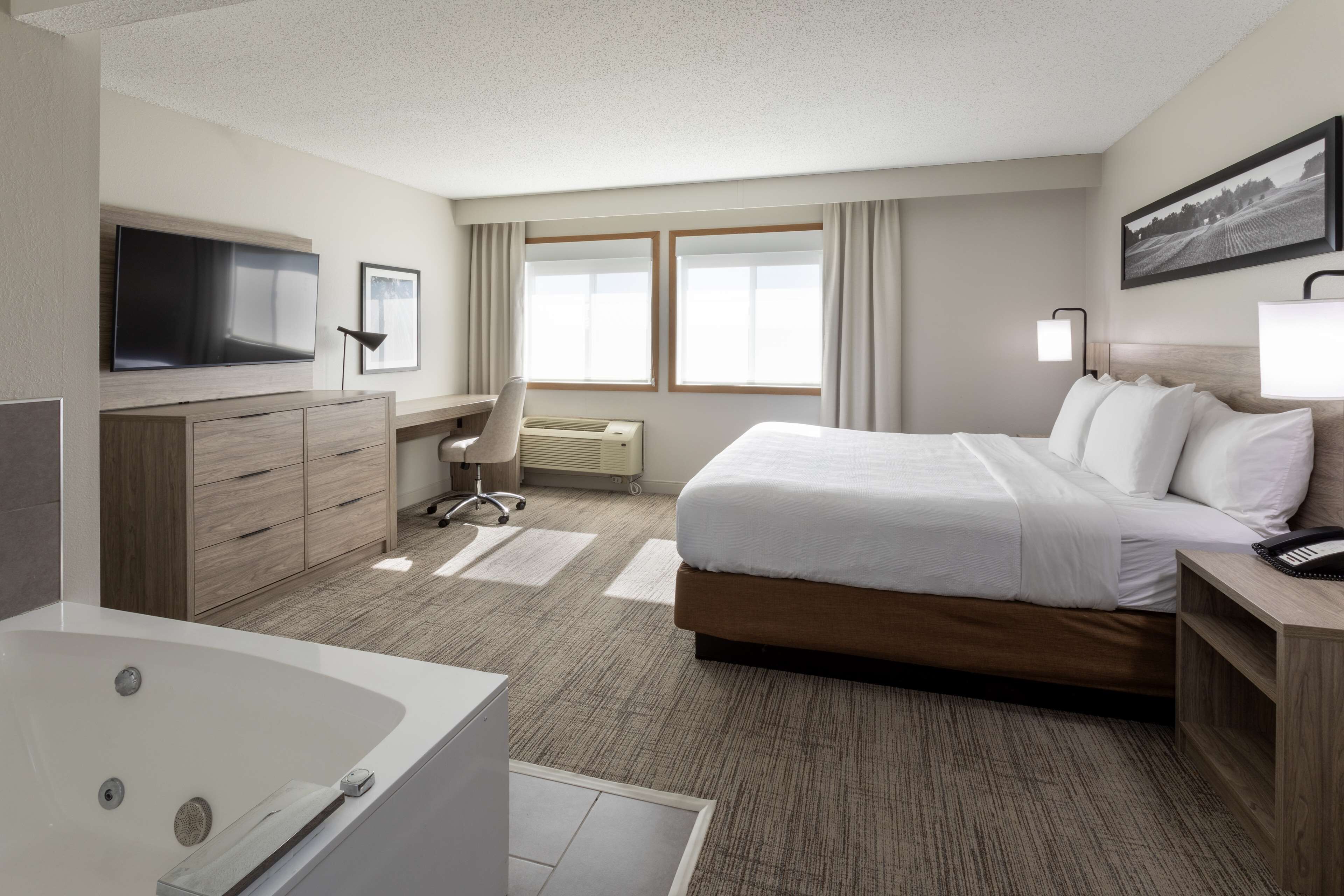 suite, 1 bedroom (king, whirlpool) | premium bedding, desk, laptop workspace, blackout curtains