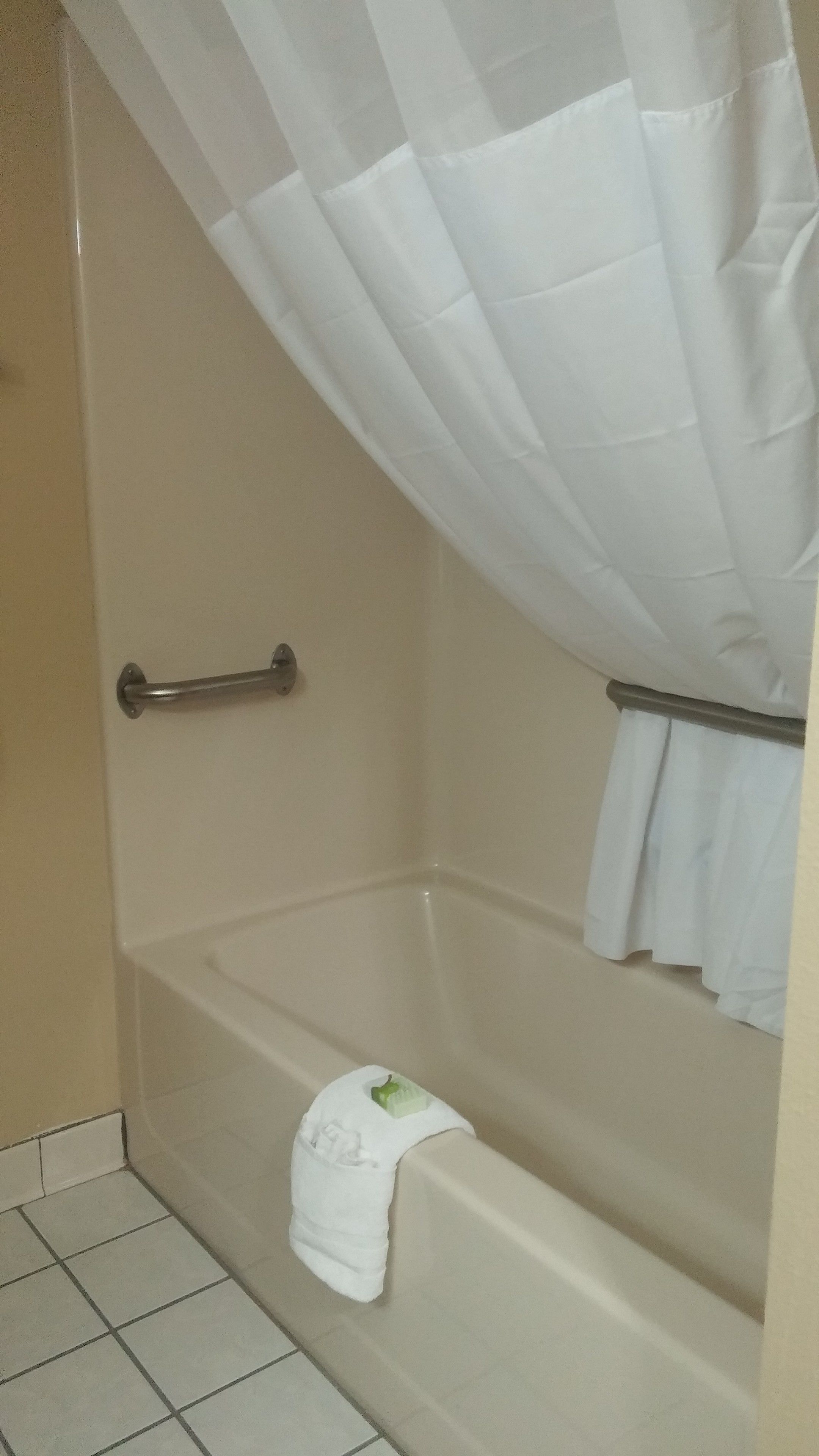 premium bedding, desk, laptop workspace, blackout curtains