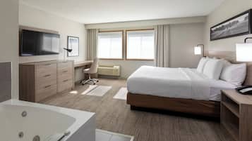 Suite, 1 habitación (King, Whirlpool) | Ropa de cama de alta calidad y escritorio