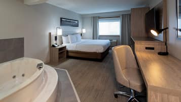 Kamer, 1 kingsize bed (Whirlpool) | Luxe beddengoed, een bureau, een laptopwerkplek