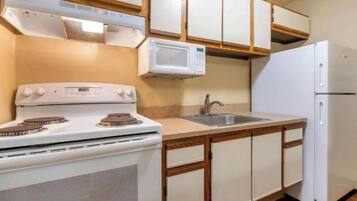 Full-size fridge, microwave, stovetop
