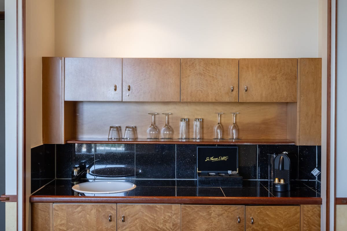 suite, 1 bedroom, ocean view | in-room safe, iron/ironing board, free wifi, bed sheets