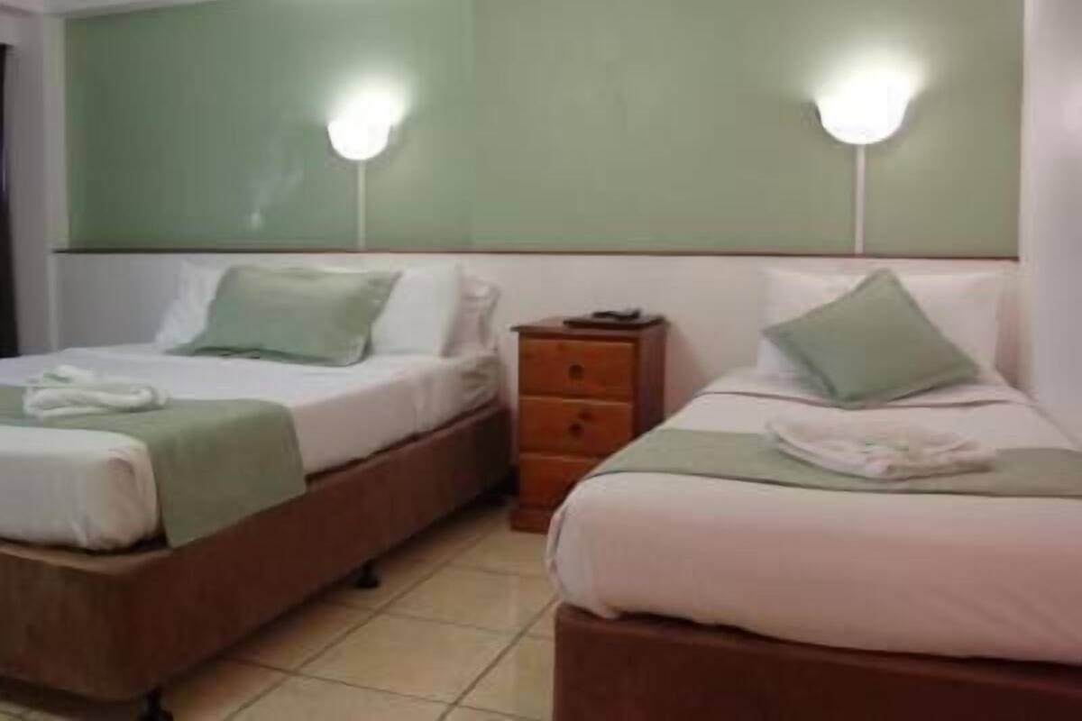 Standard Queen/Single Twin Share with Balcony | Blackout drapes, iron/ironing board (on request), WiFi (free)
