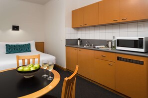 Studio (Twin) | Private kitchen | Mini-fridge, coffee/tea maker, electric kettle