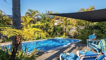 Outdoor pool, pool umbrellas, sun loungers