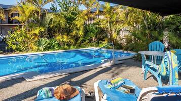 Outdoor pool, pool umbrellas, sun loungers