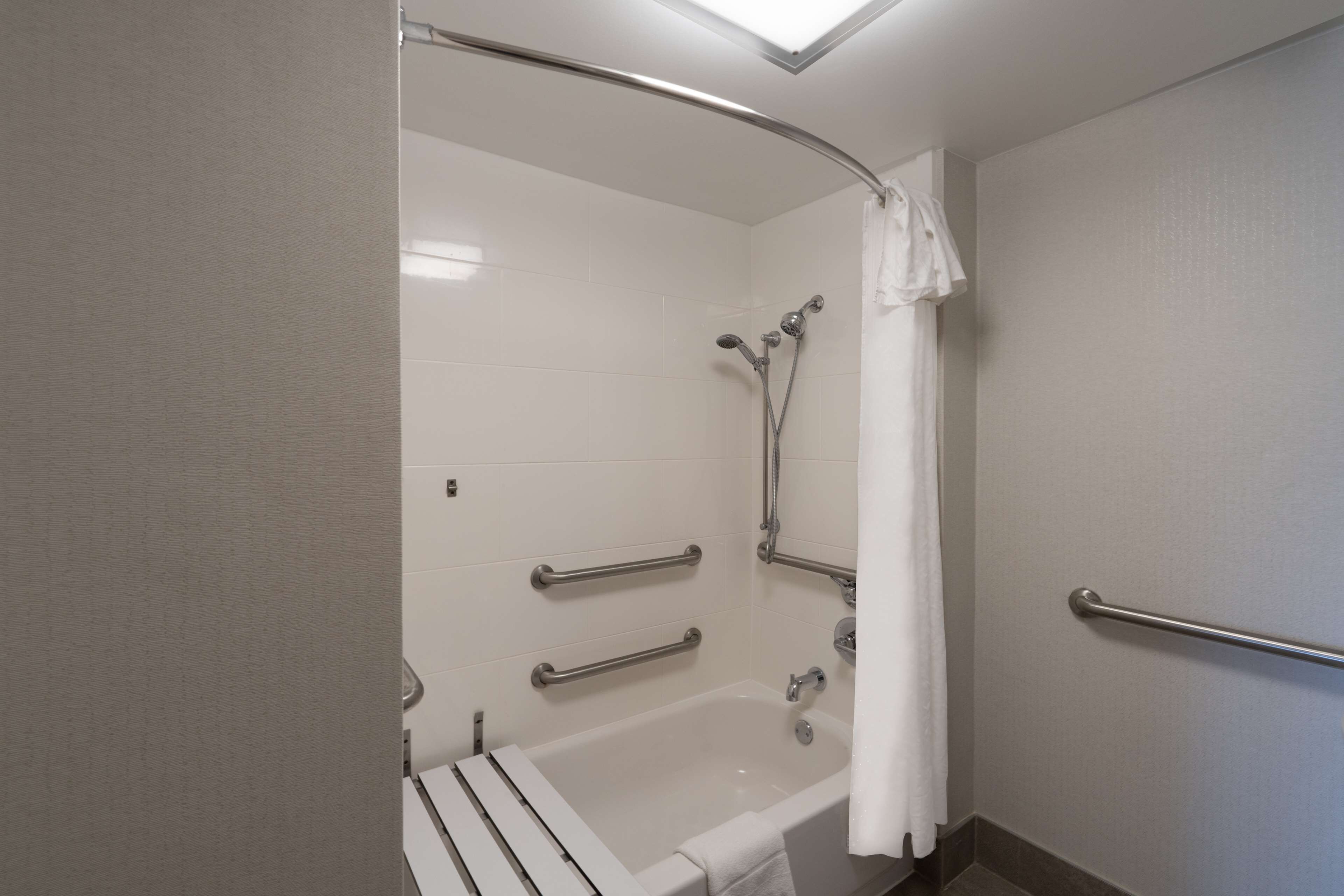 suite, 1 king bed, accessible, bathtub (mobility & hearing) | bathroom | combined shower/bathtub, free toiletries, hair dryer, towels