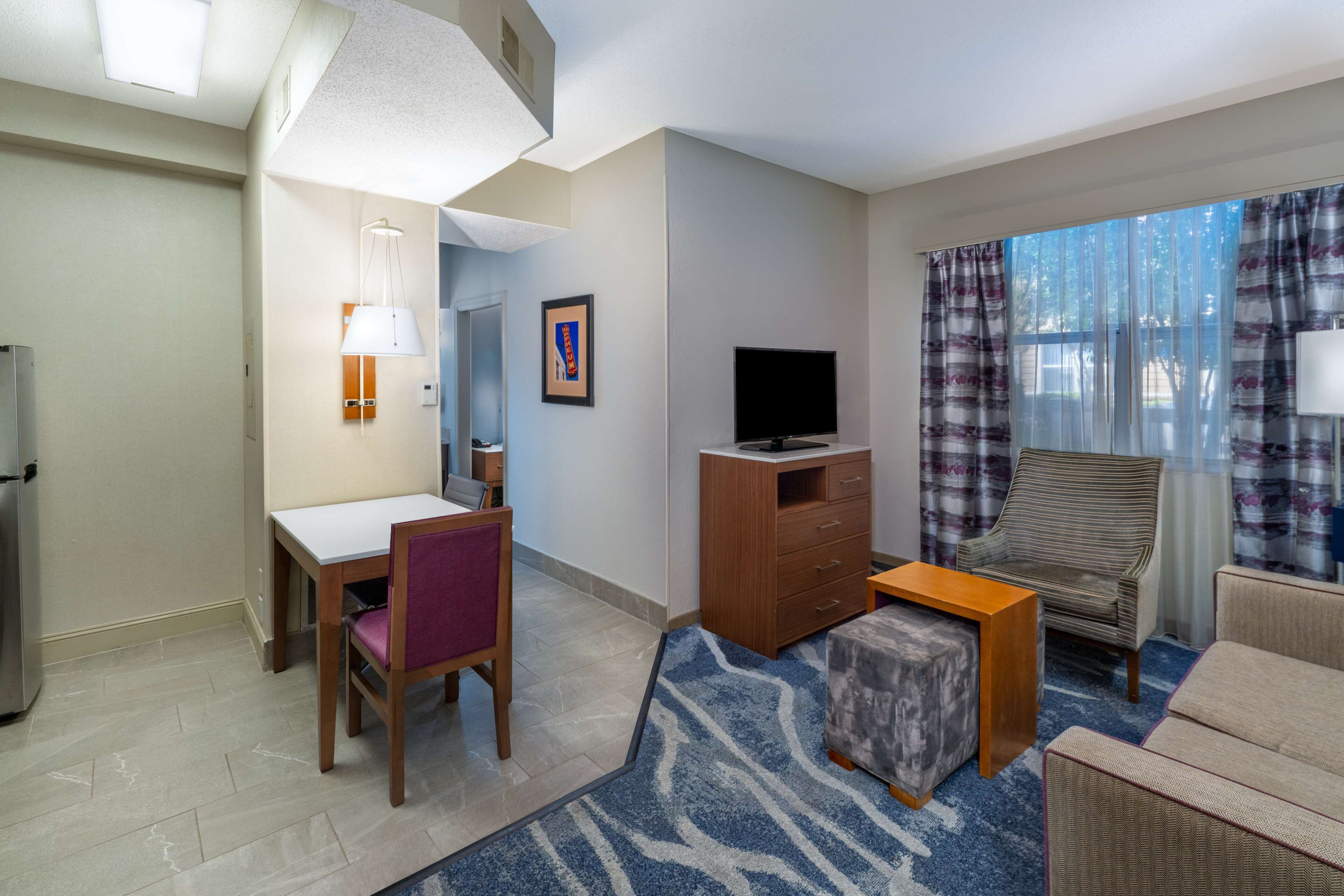 suite, 1 bedroom | living area | 27-inch flat-screen tv with cable channels, tv, dvd player