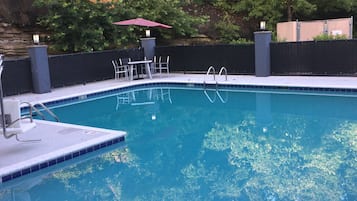 Seasonal outdoor pool, open 8:00 AM to 10:00 PM, pool umbrellas