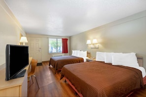 Desk, laptop workspace, blackout curtains, free cots/infant beds
