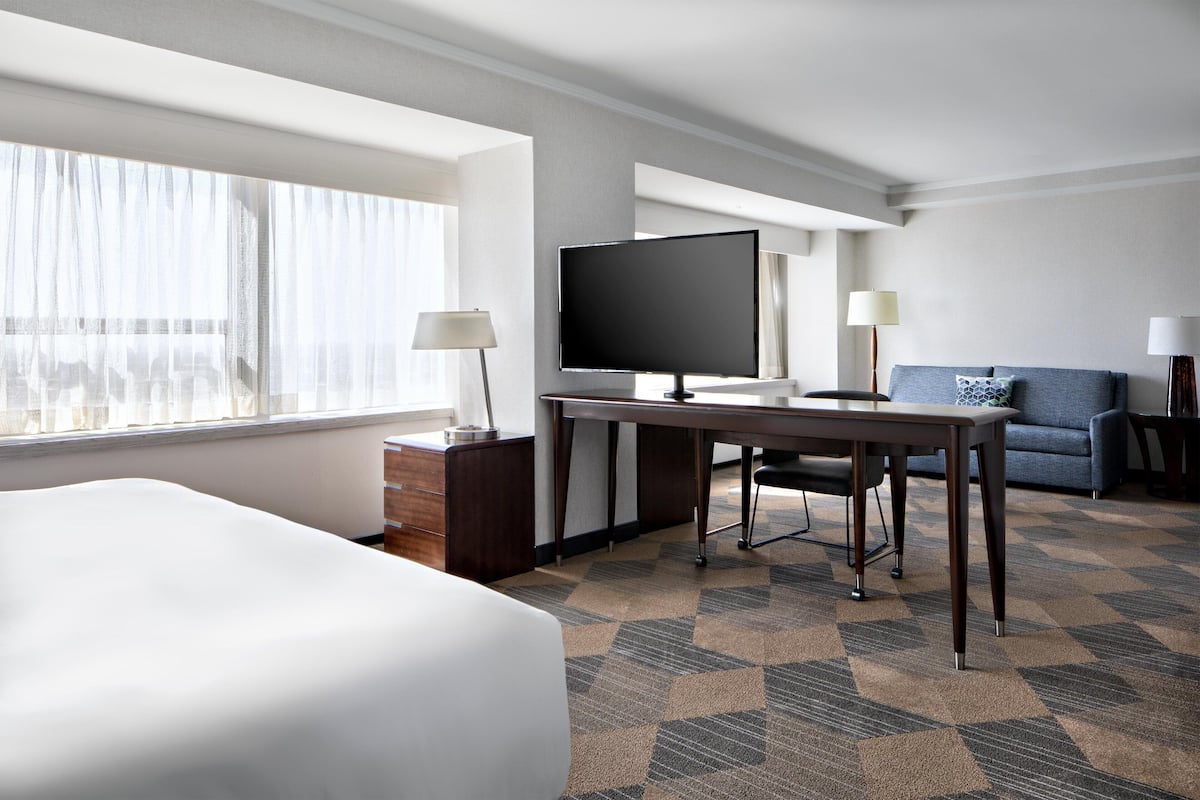 Junior Suite, 1 King Bed with Sofa bed, Non Smoking | Living area | 50-inch plasma TV with cable channels, TV, pay movies