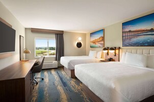 Premium bedding, desk, laptop workspace, soundproofing