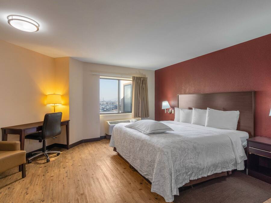 Desk, blackout curtains, free cots/infant beds, free WiFi