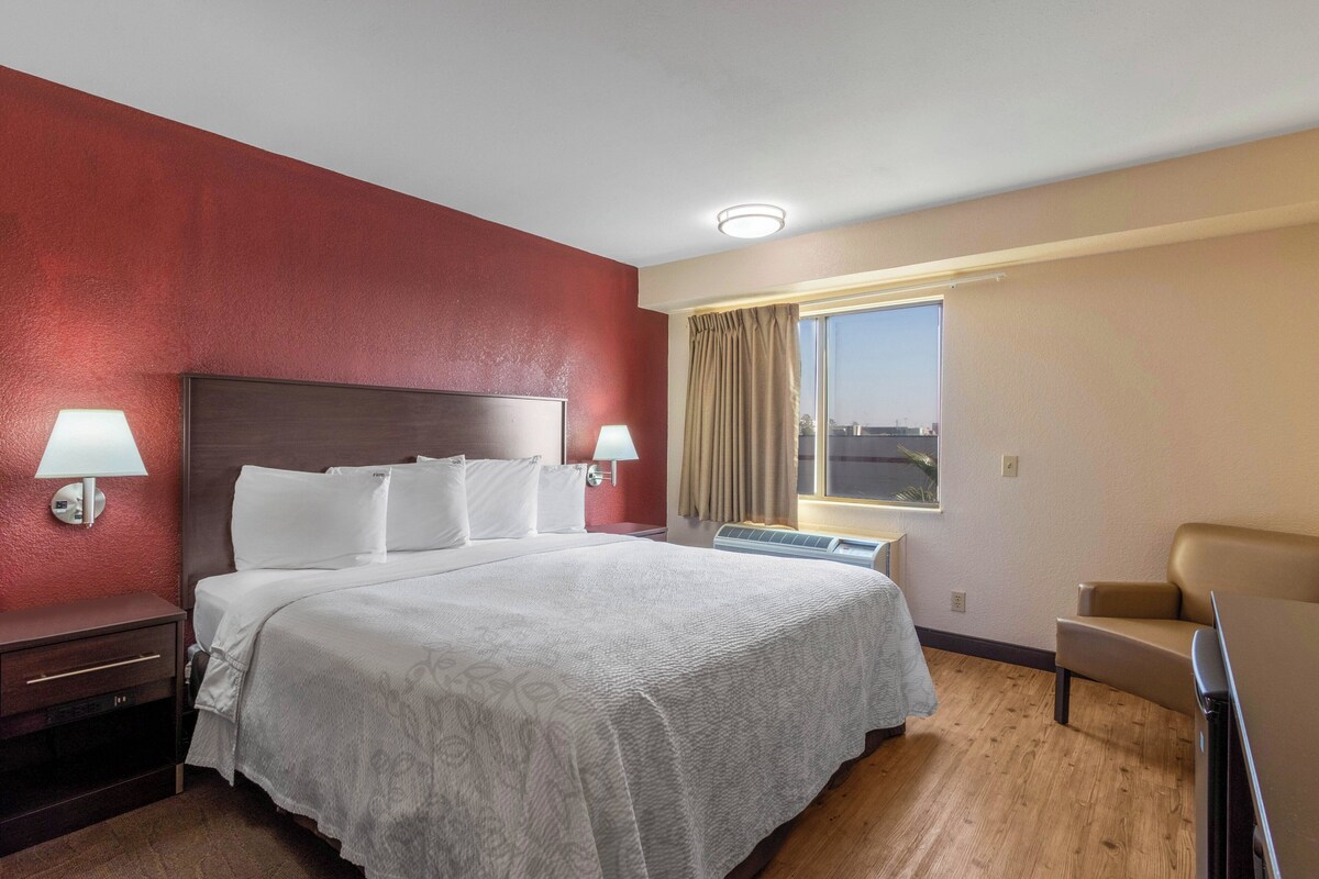 Desk, blackout drapes, cribs (free), WiFi (free)