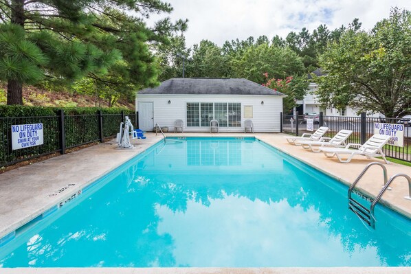 Seasonal outdoor pool, pool loungers