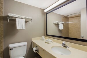 Combined shower/tub, free toiletries, towels, soap