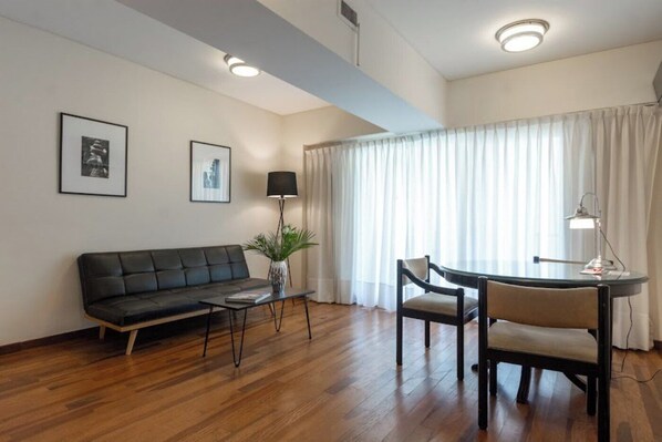 Premier Suite | Living area | 32-inch LCD TV with cable channels