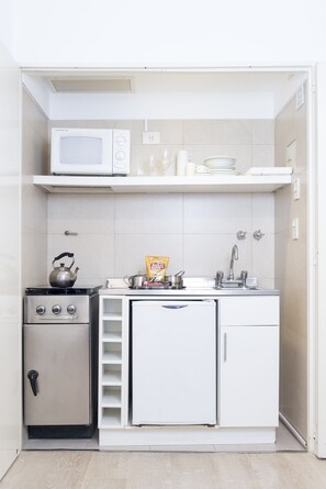 Ropa de cama de alta calidad, colchones con acolchado adicional, minibar